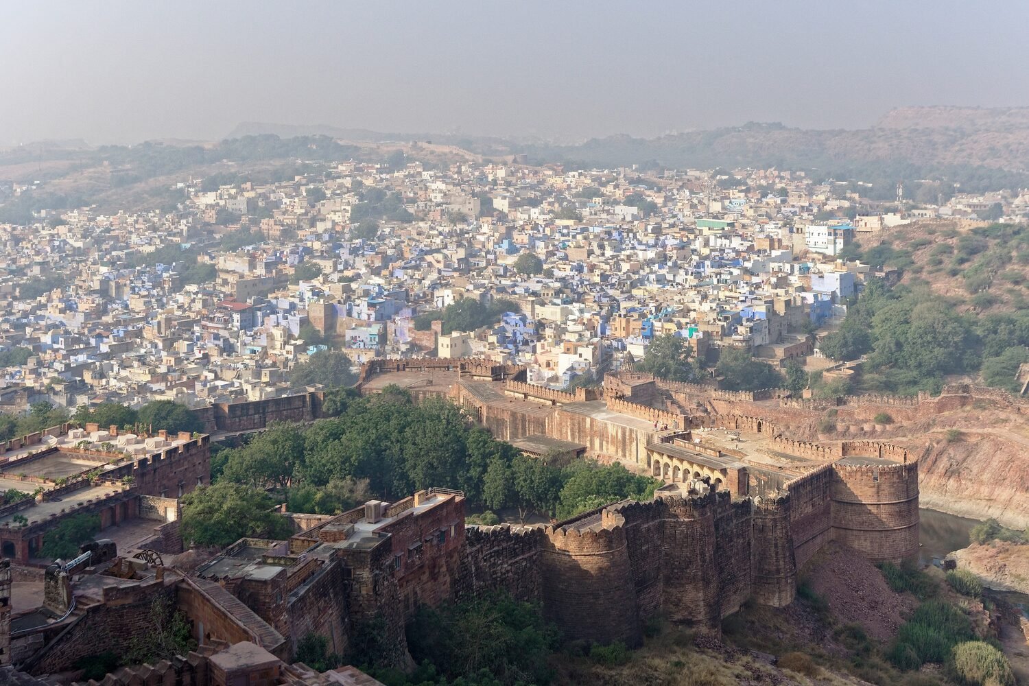 The blue houses of old Jodhpur spread beneath the ramparts of Mehrangarh Fort